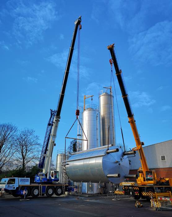 Curtis Power cranes doing a top and tail silo lift